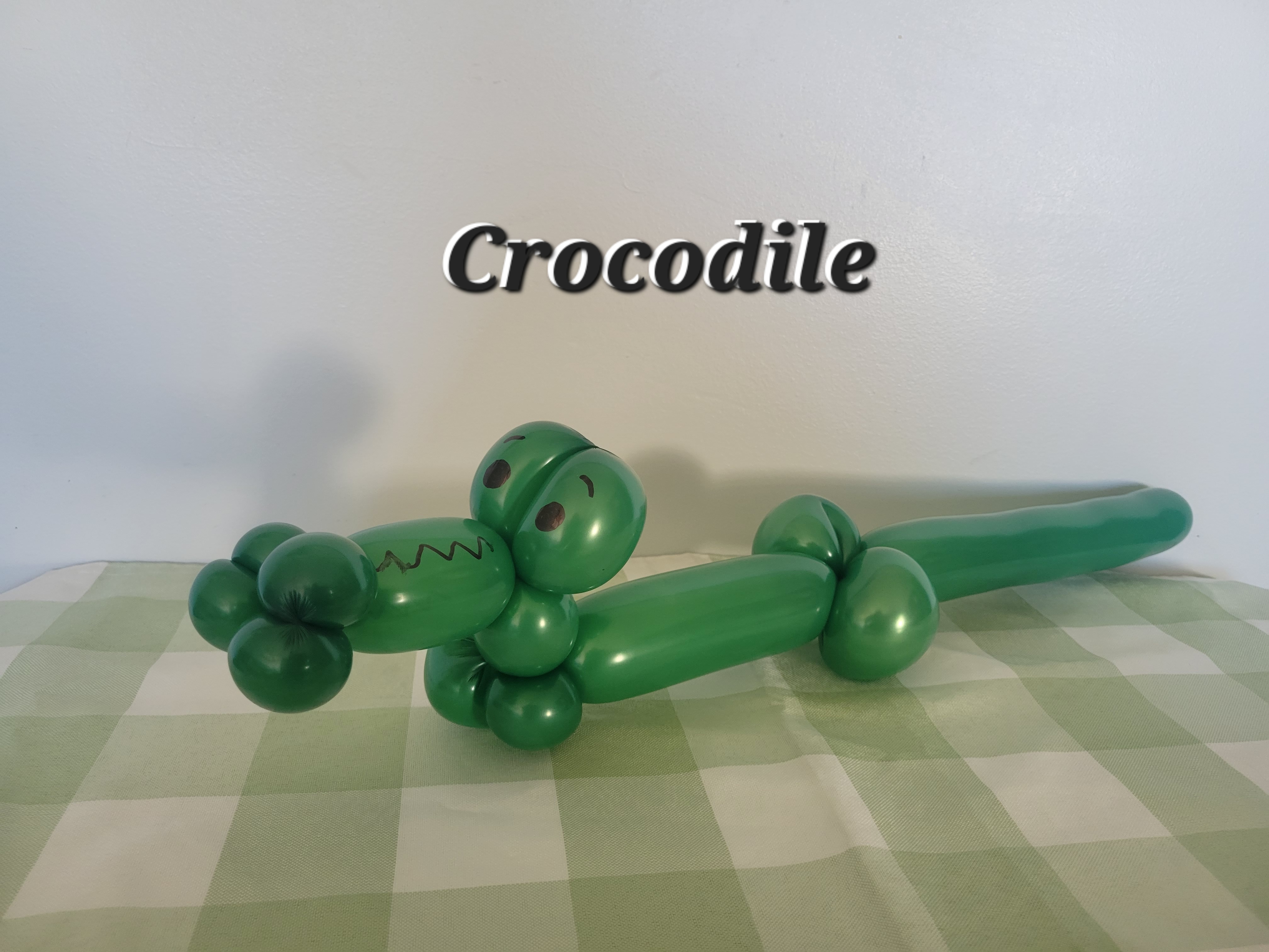green balloon crocodile