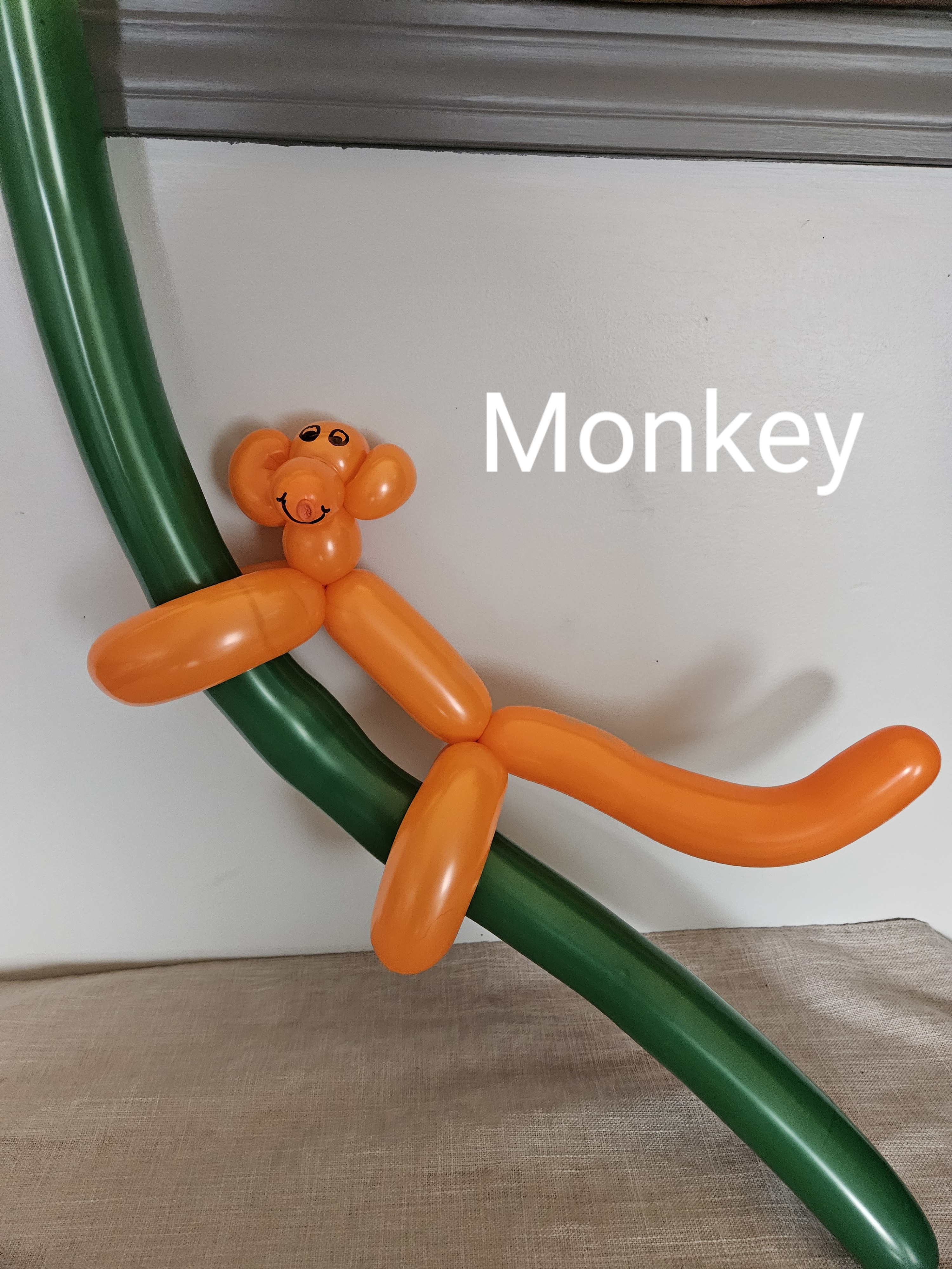 orange balloon monkey