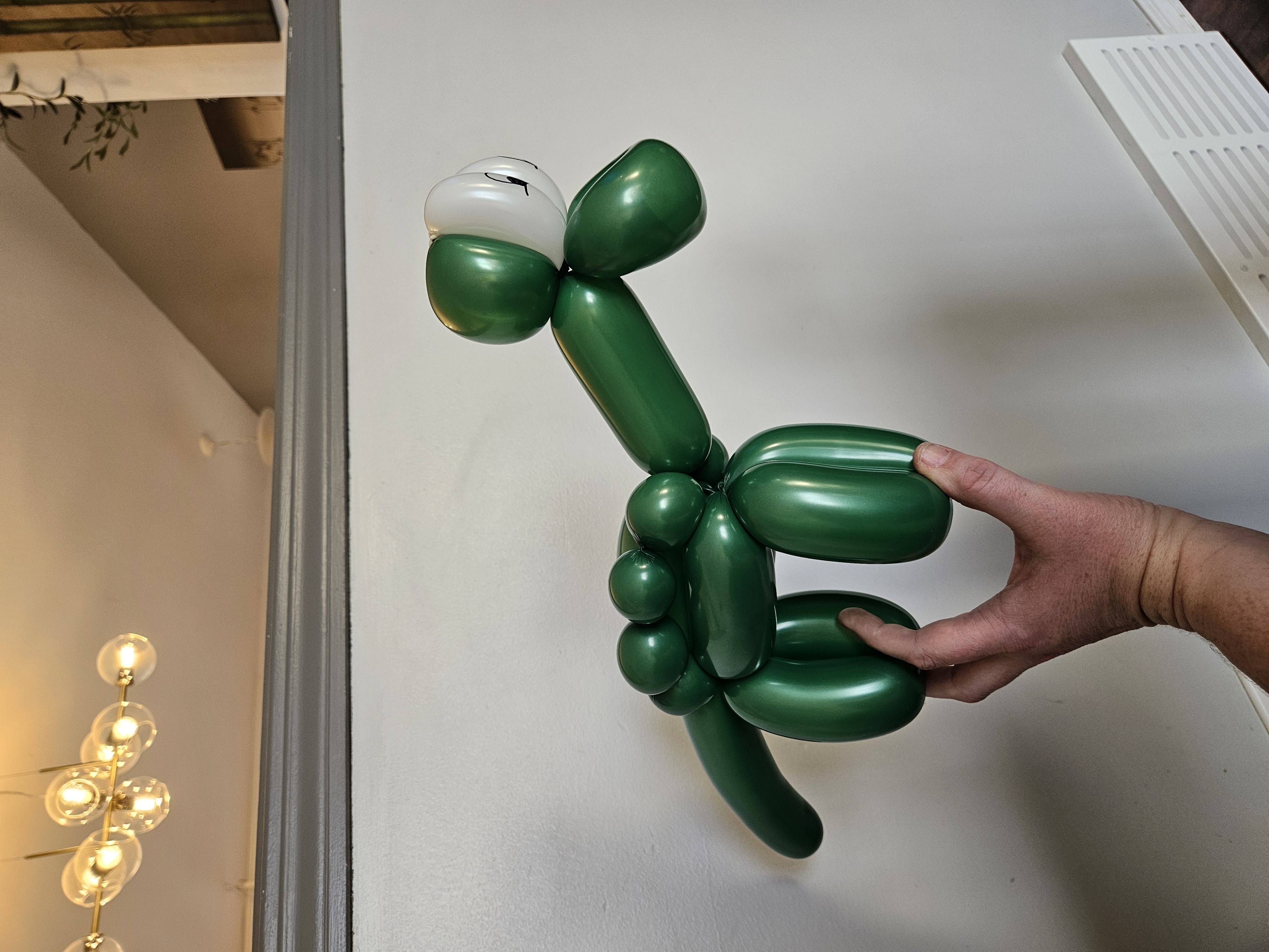 green balloon long neck dino