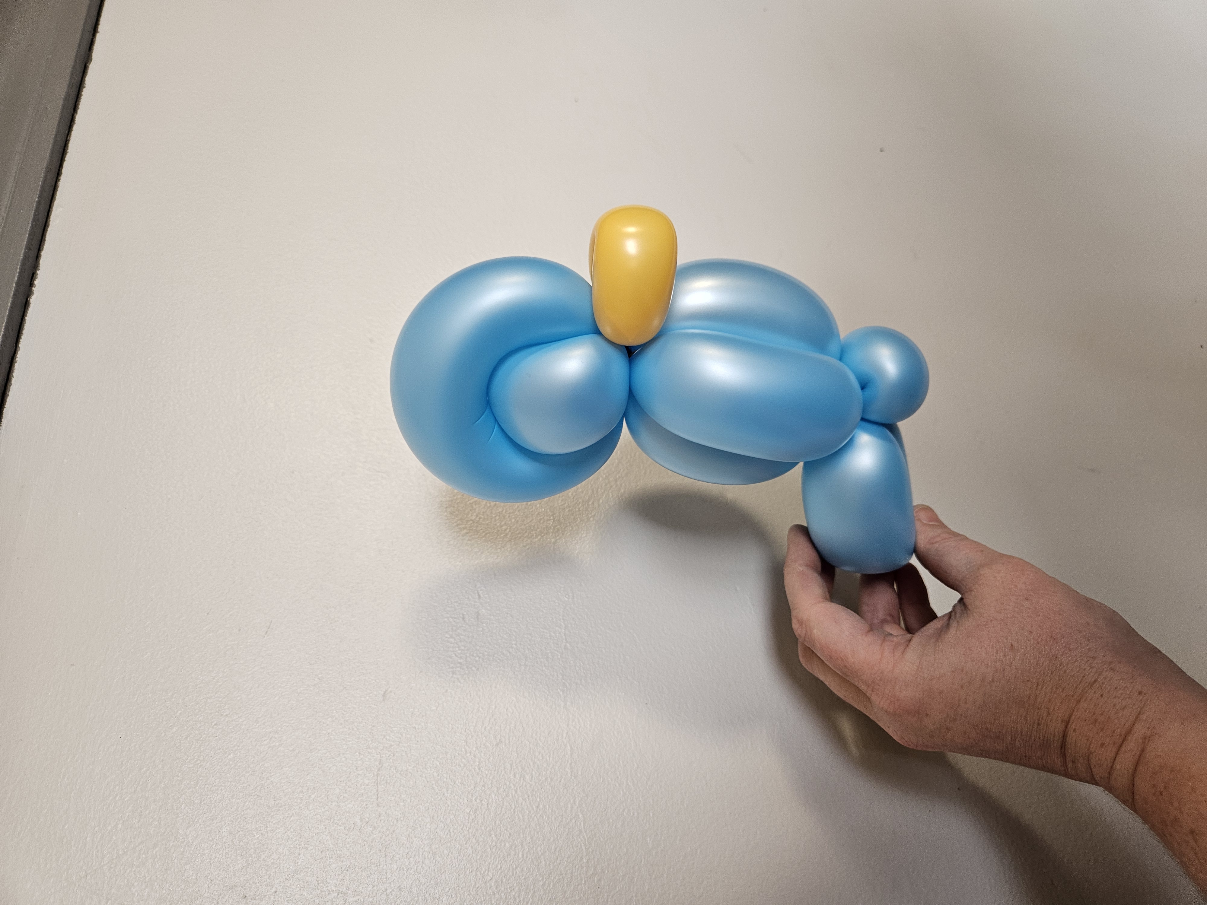 blue balloon bird