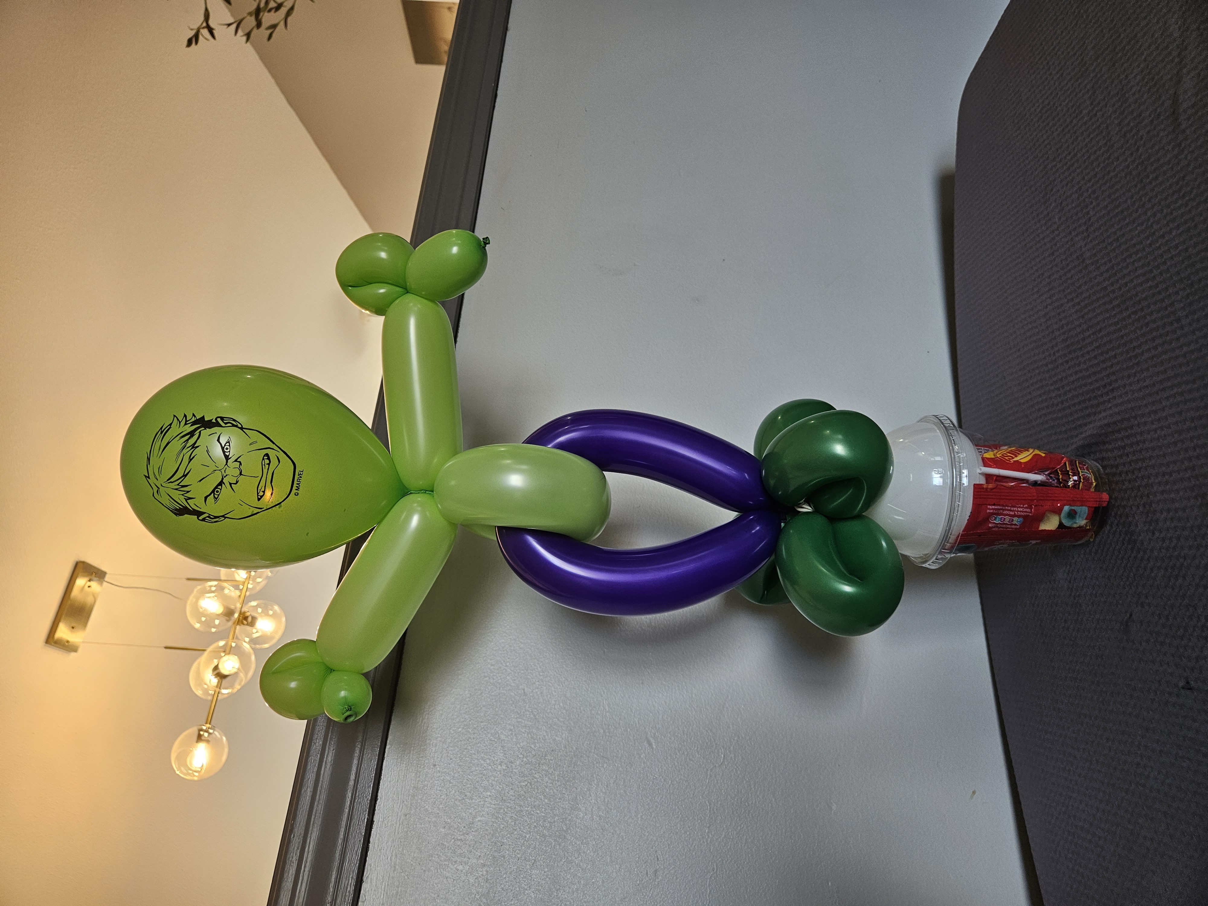 Balloon hulk on a candy cup