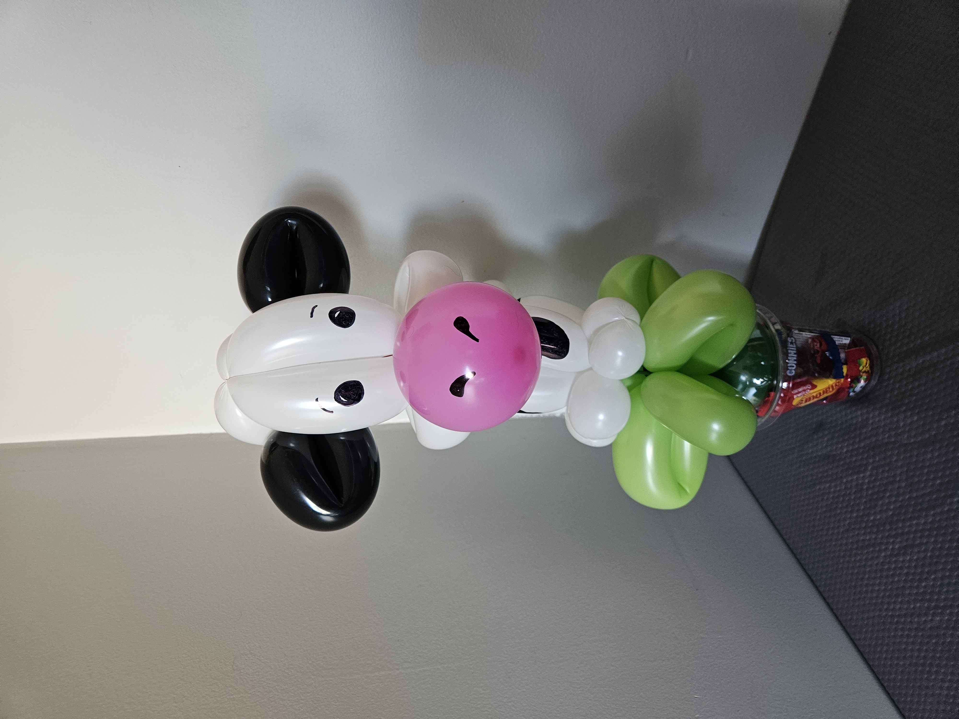 Balloon cow on a candy cup