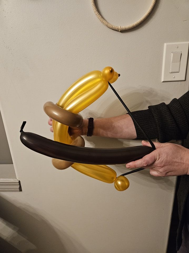 Balloon bow and arrow
