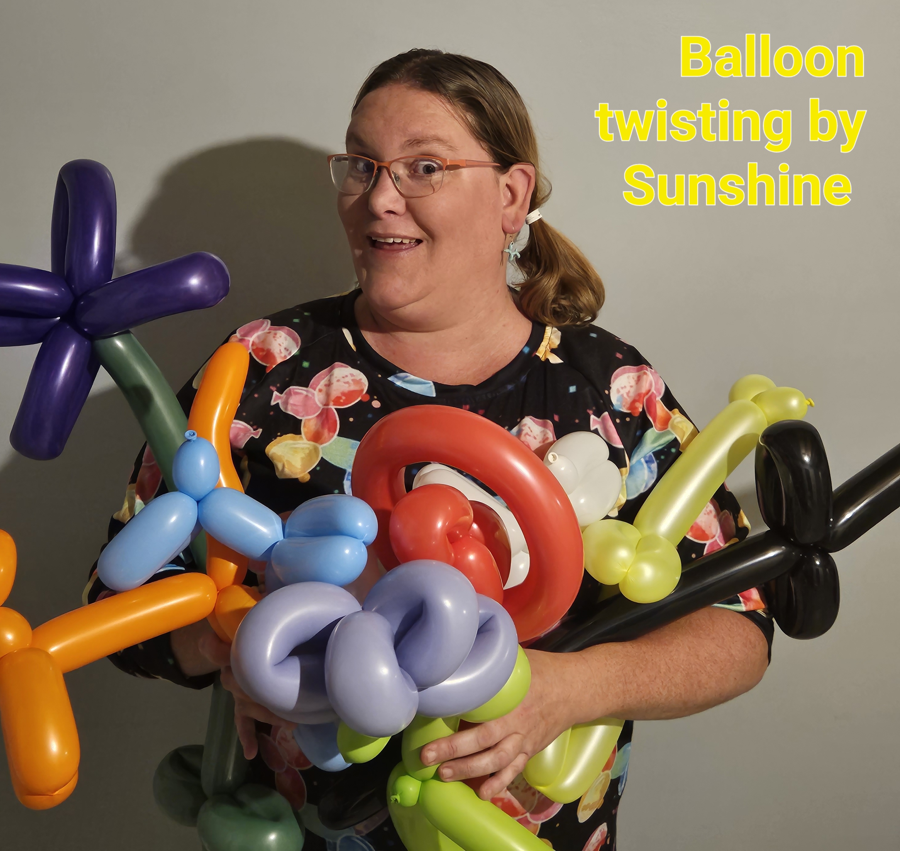 sunshine holding balloons