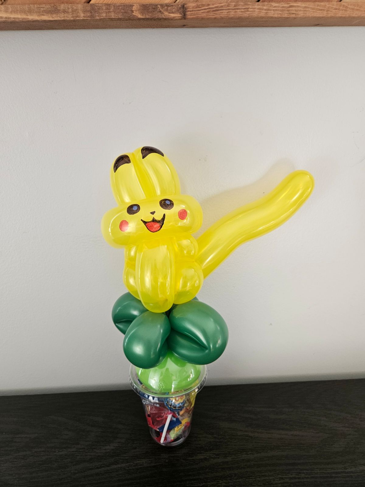 Balloon pikachu on a candy cup