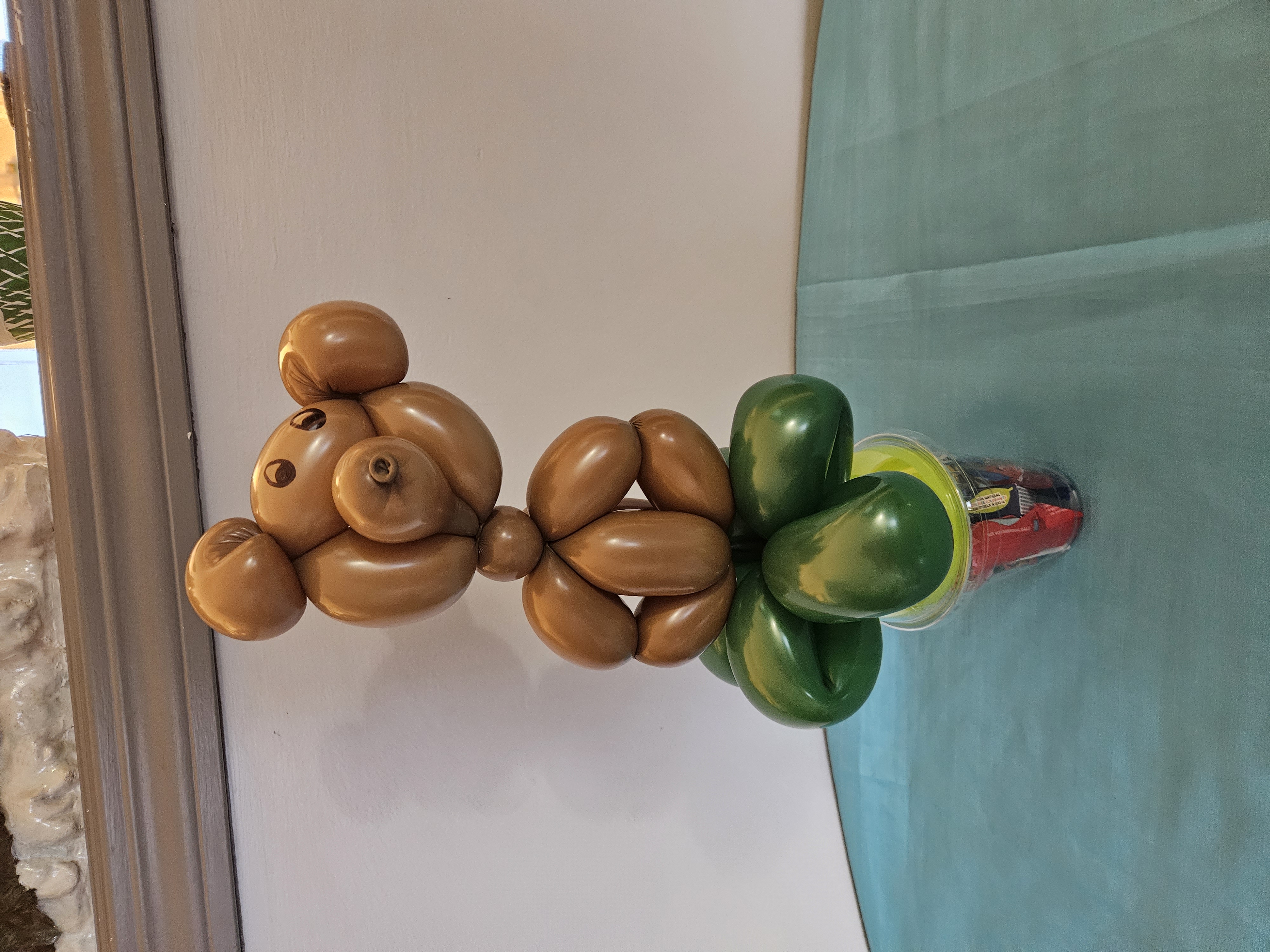 teddy bear on a candy cup