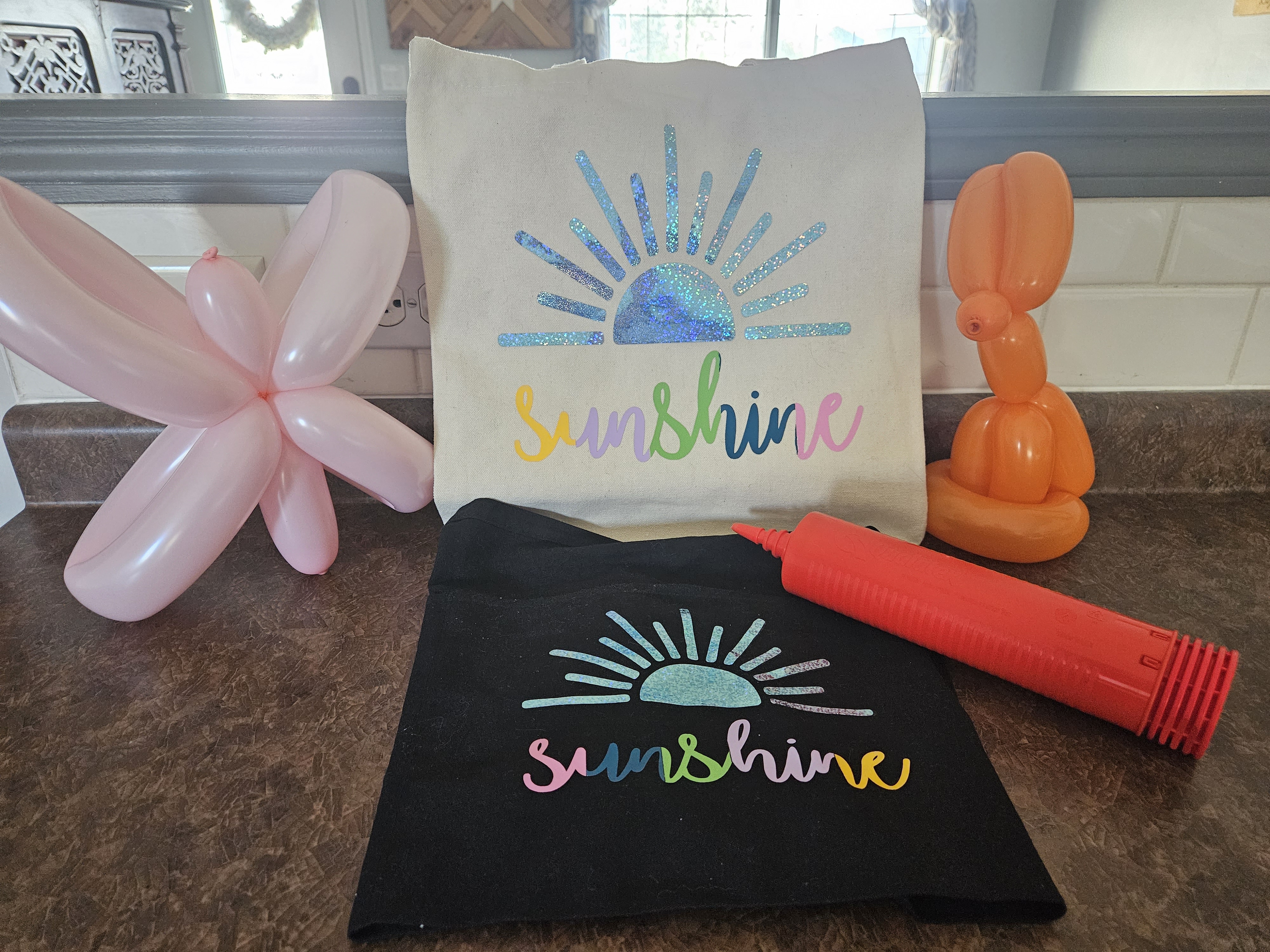 sunshine name plate and balloons